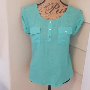 Green blouse with back cutout detail size small